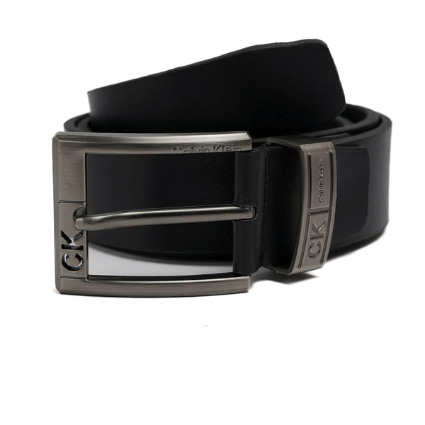 Black Calvin Klein belt with silver buckle on a white background