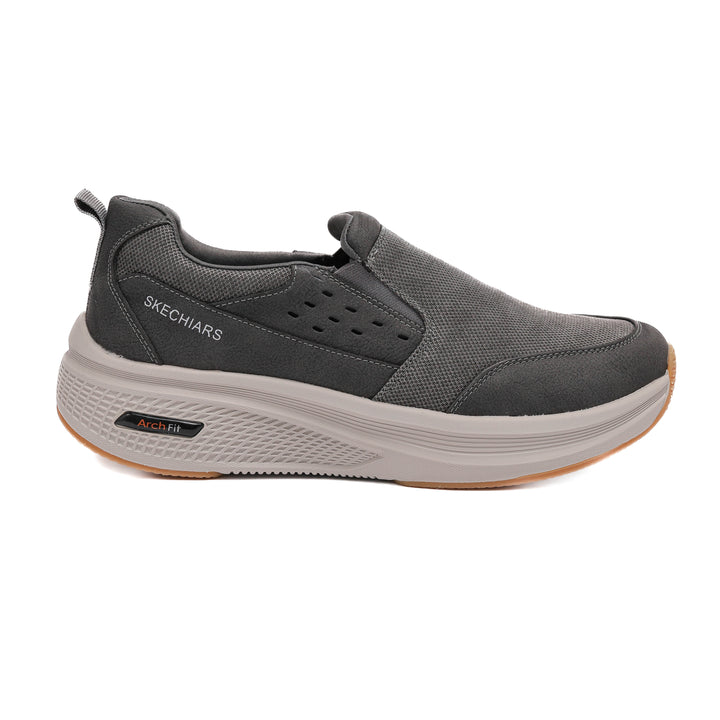 Gray sneaker with 'Skechers' branding on a white background